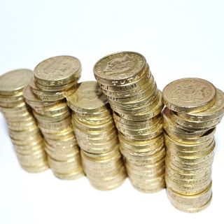 Image of a stack of coins representing the UK-ICOS costs